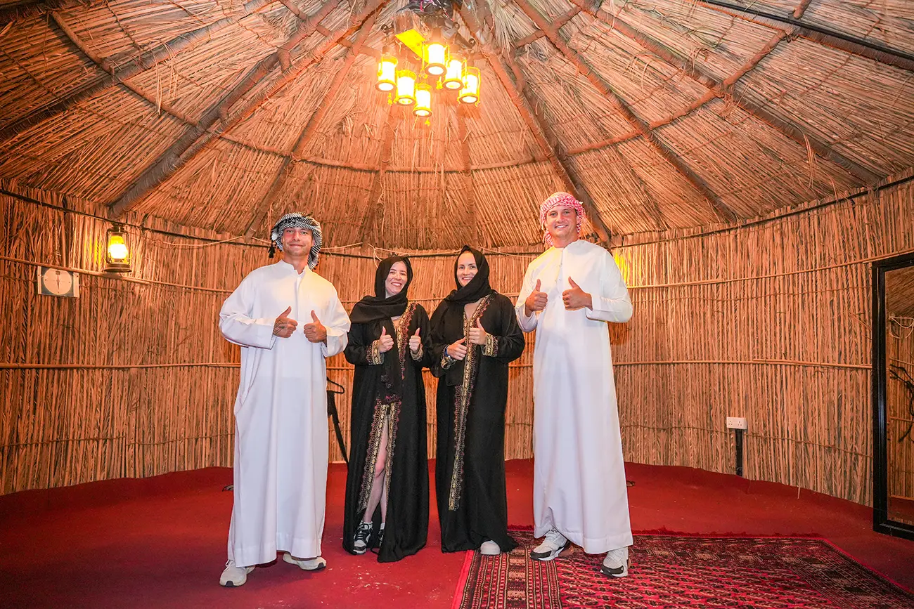 Guests posing in traditional dress